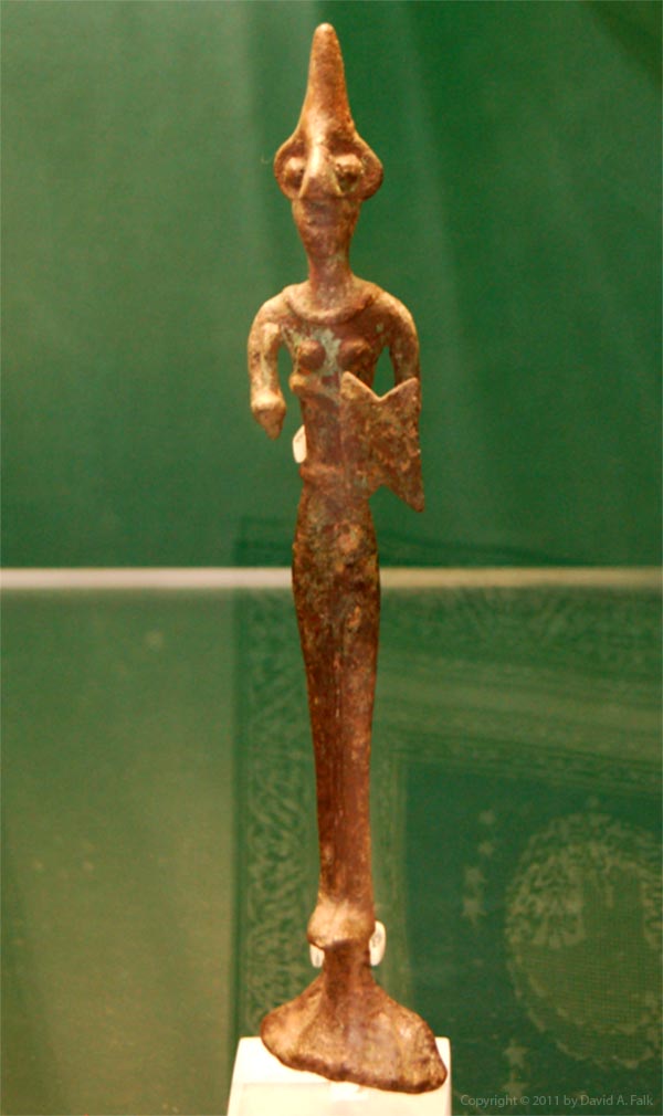 A bronze figure of a deity from Alalakh.